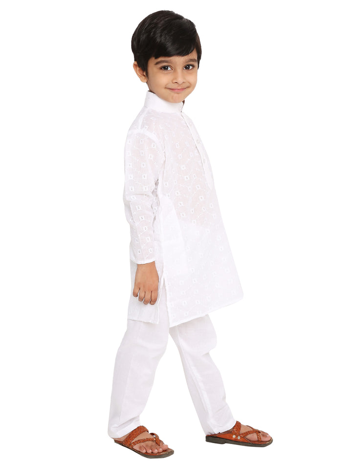 Side view of Maharaja Kids Kurta Set - Cotton Kurta Pyjama in white, showcasing elegant self design and relaxed fit for festive or casual occasions.