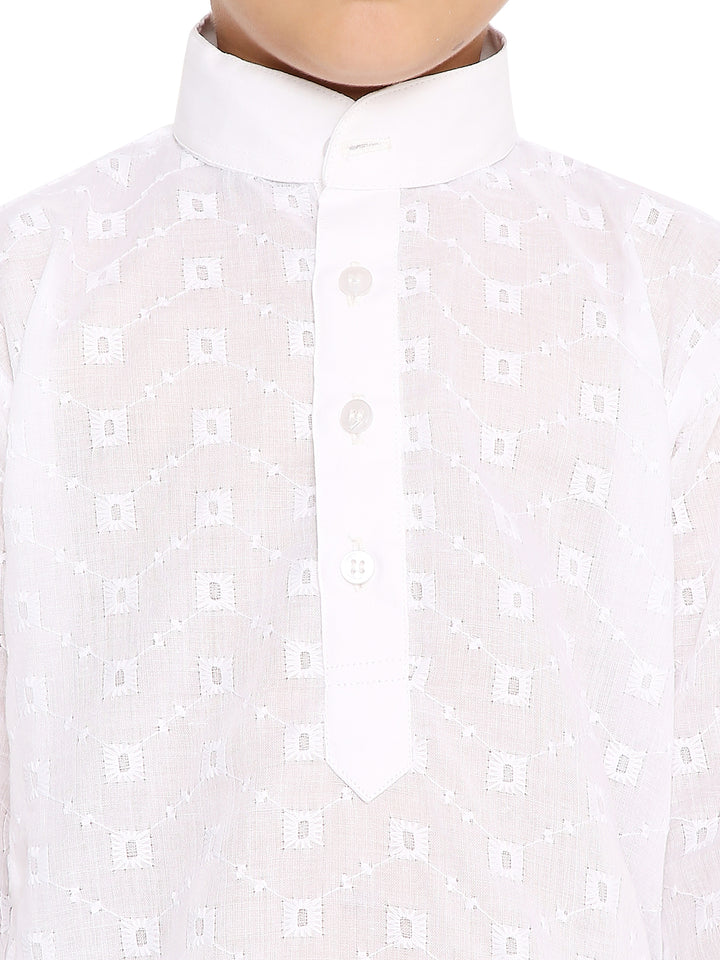 Close-up of Maharaja Kids Kurta Set - Cotton Kurta Pyjama collar and button placket, showing intricate self design and neat stitching.