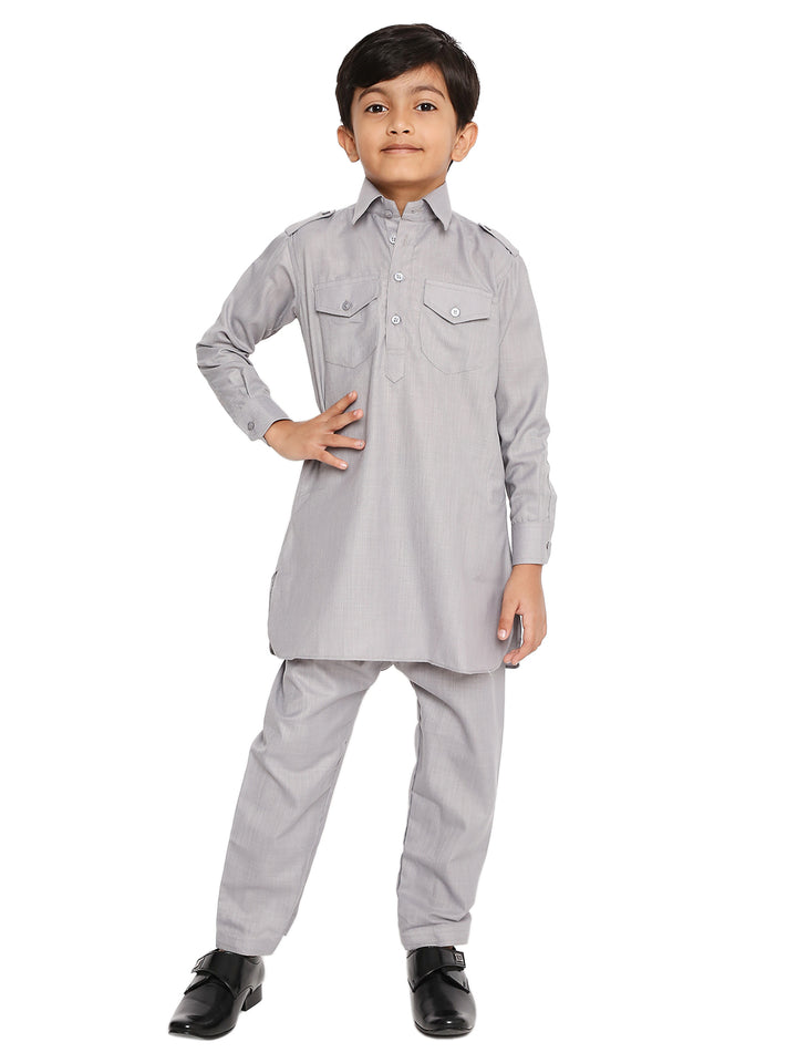 Grey Pathani Set for Kids - Kurta Pyjama Set featuring wrinkle-free poly blend fabric with buttoned chest pockets and full sleeves, ideal for festive wear.