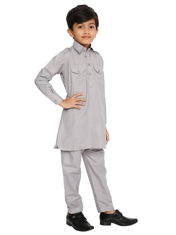 Side pose of boy wearing Grey Pathani Set for Kids - Kurta Pyjama Set, showcasing stylish collar and wrinkle-free fabric for all-day comfort.