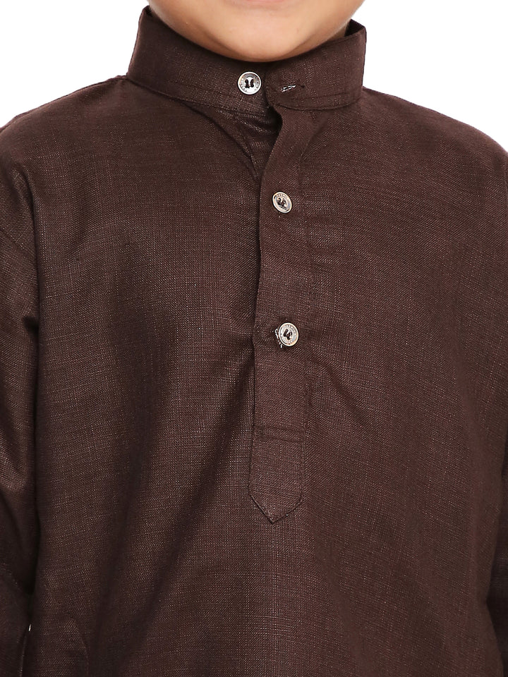 Close-up of brown cotton kurta's button placket and mandarin collar. Highlights the fine stitching and traditional design for boys ethnic wear.