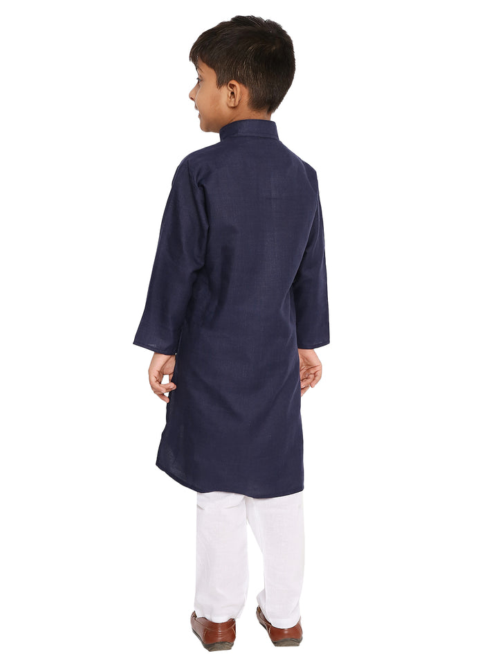 Back view of dark blue Maharaja Boys Kurta Set with white pyjama, highlighting traditional design and comfortable cotton blend fabric.
