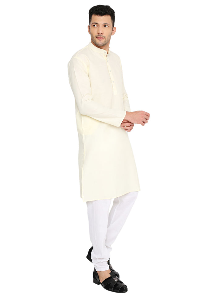 Magic Cotton Solid Kurta in lemon yellow styled with white pyjama, part of the Maharaja Kurta Set, perfect for weddings and cultural events.