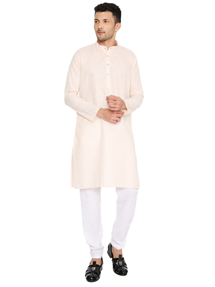 Magic Cotton Peach Kurta for men with a comfortable fit, featuring a mandarin collar and button placket, paired with white churidar.