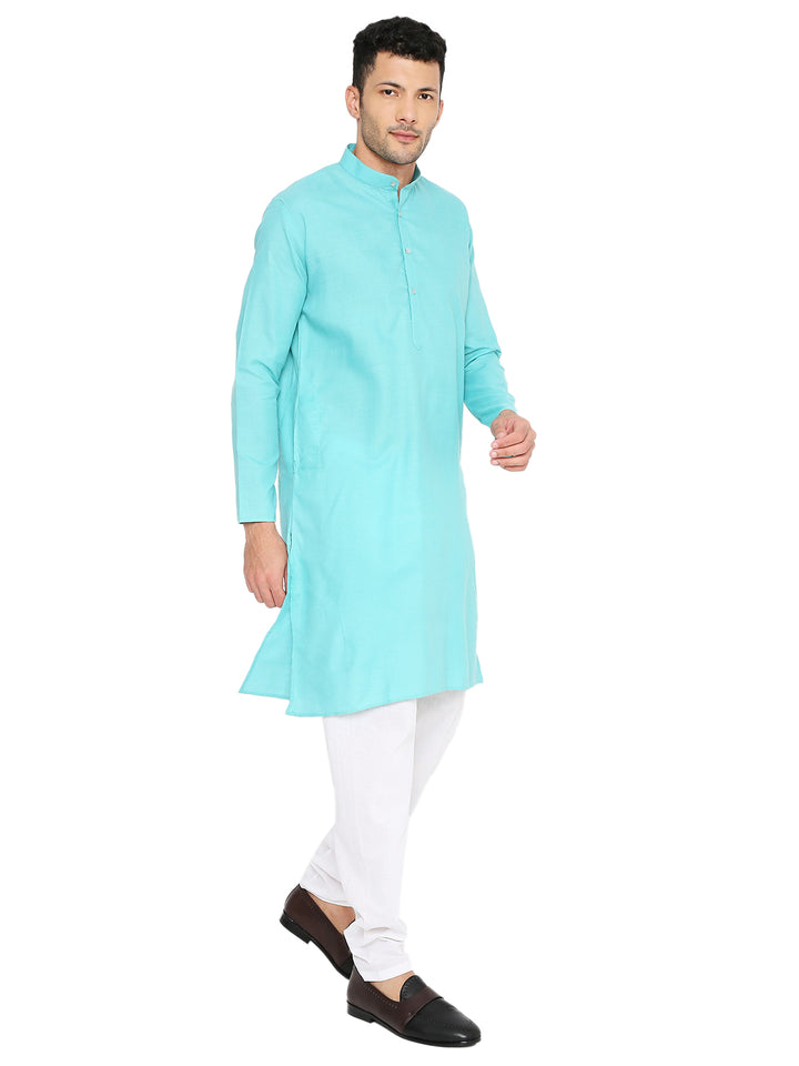 Turquoise cotton kurta with adjustable waist and side slits, styled with white churidar for a versatile ethnic look.