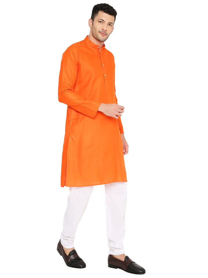 Magic Cotton Kurta in orange with relaxed fit and white bottoms, perfect for gifting or ethnic celebrations.