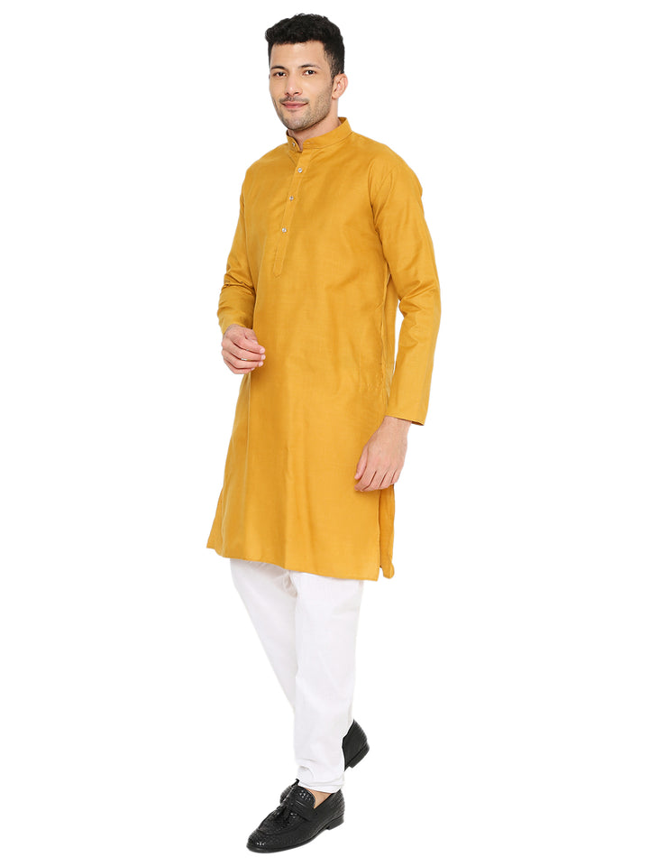 Side angle of Magic Cotton Ocher Kurta - Comfort Fit Men, highlighting the elegant silhouette and buttoned neckline.