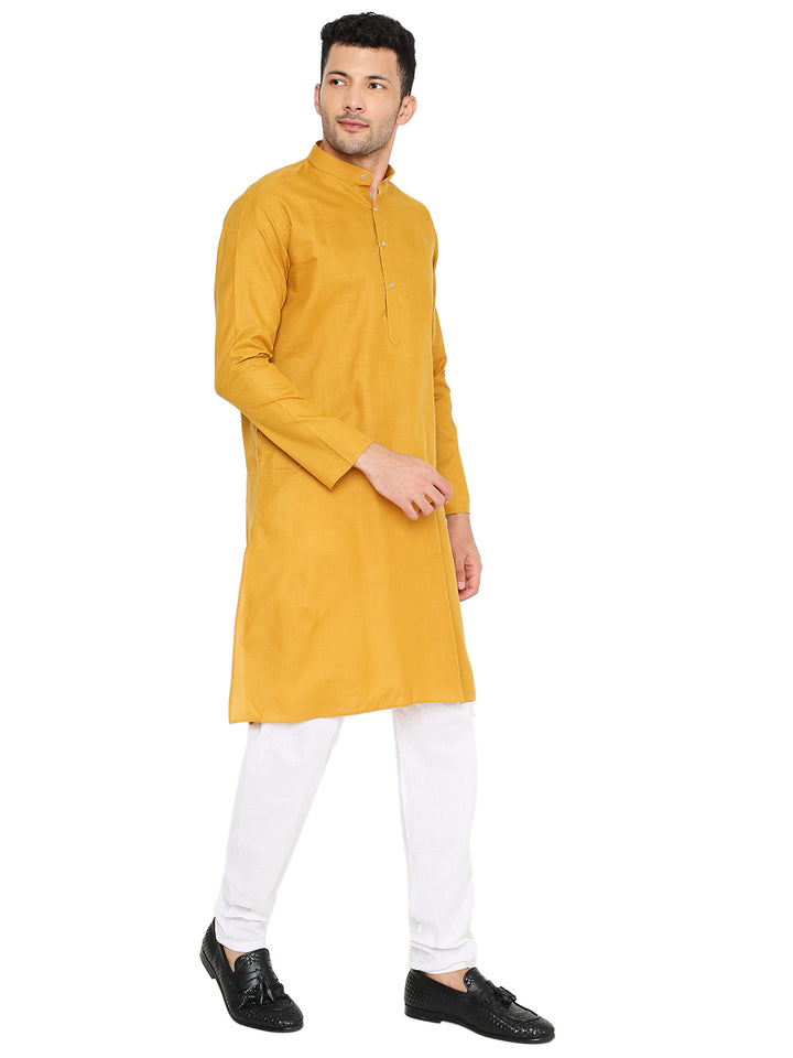 Magic Cotton Ocher Kurta for men in a walking pose, emphasizing its relaxed fit and stylish traditional appeal.