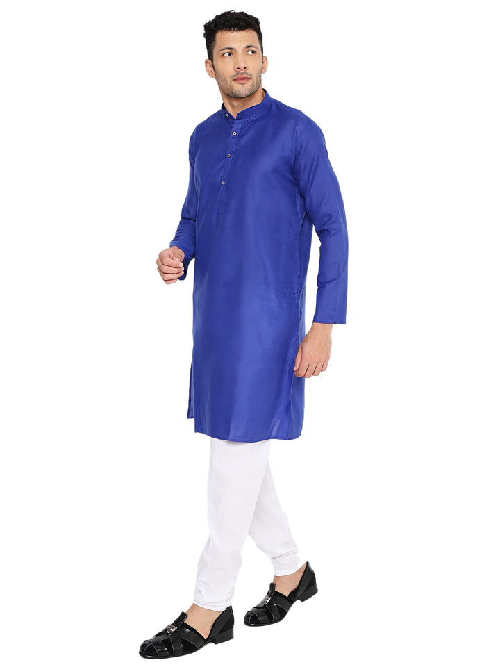 Side view of Magic Cotton Kurta in royal blue, styled with white bottoms, highlighting its comfort fit and elegant silhouette.