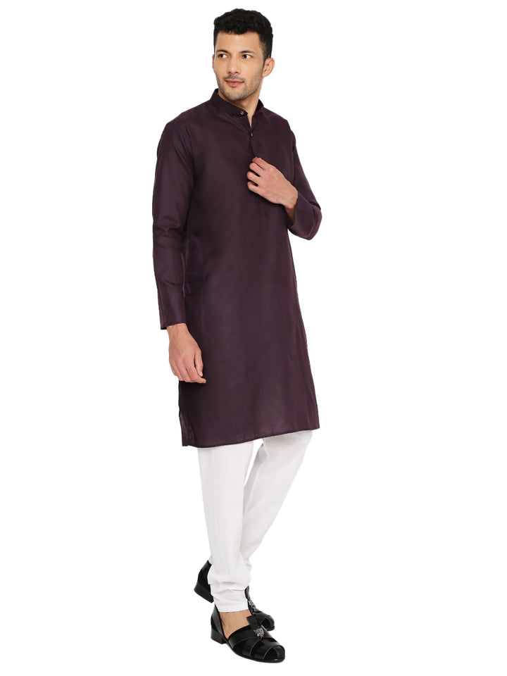Model wearing plum Magic Cotton Kurta with white pajama, showing its comfortable fit and elegant traditional design.