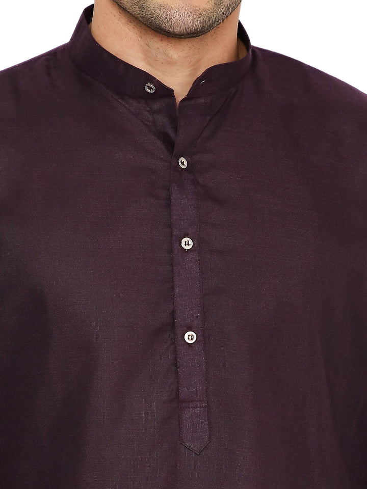 Close-up of Magic Cotton Kurta in plum showing button placket and mandarin collar, emphasizing fine stitching and fabric texture.