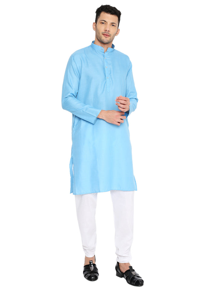 Magic Blue Cotton Kurta for men with mandarin collar and button placket, styled with white churidar for casual or festive wear.