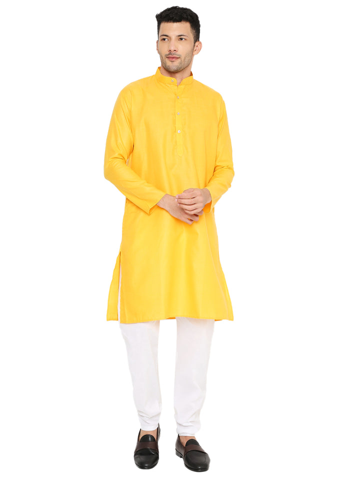 Magic Cotton Kurta Yellow with mandarin collar and button placket, styled with white pajama for traditional occasions.