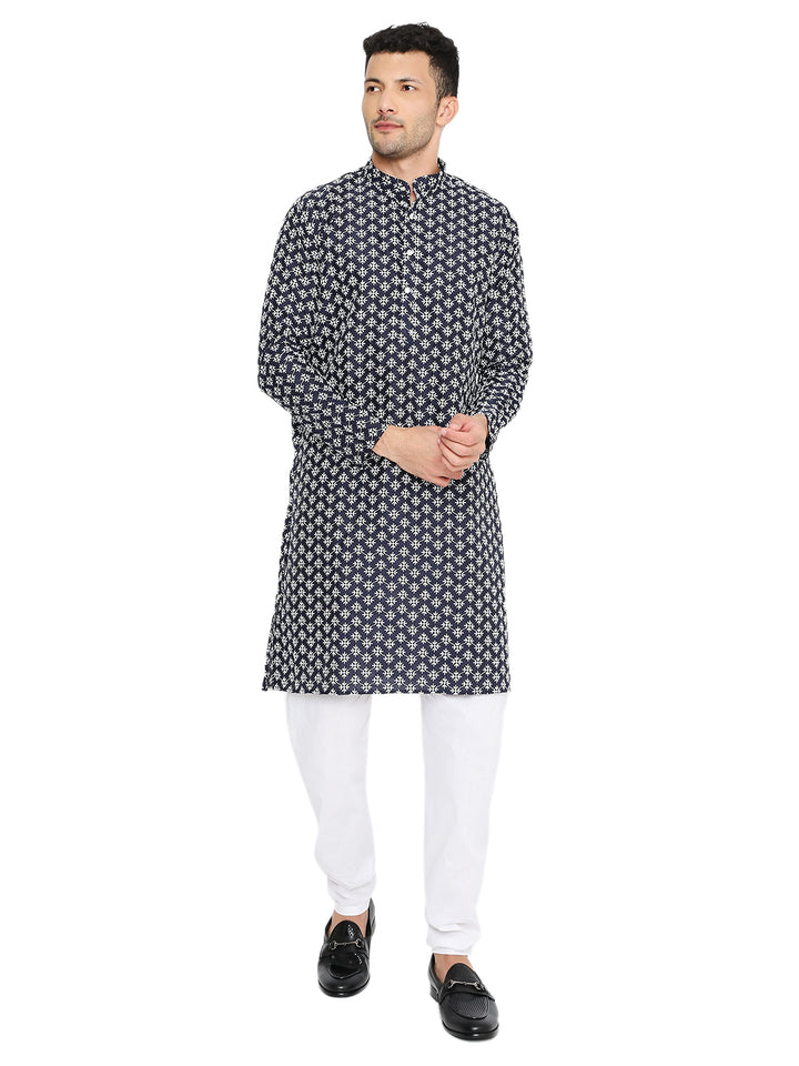 Dark Blue Banarasi Silk Kurta - Men's Dress with white floral motifs, paired with white churidar for traditional occasions.