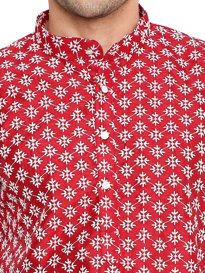 Close-up of Red Banarasi Silk Kurta fabric showing intricate white floral weave and button placket, ideal for festive wear.