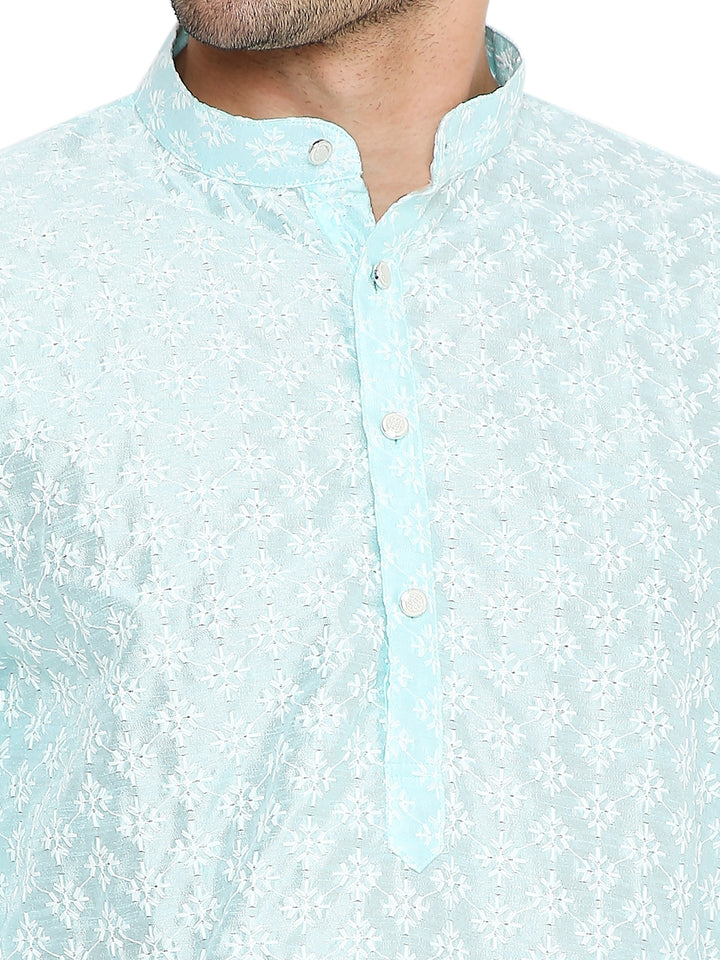 Close-up of Blue Banarasi Silk Kurta - Heritage Charm | Premium Fabric, showing detailed floral motifs and button placket on soft silk material.