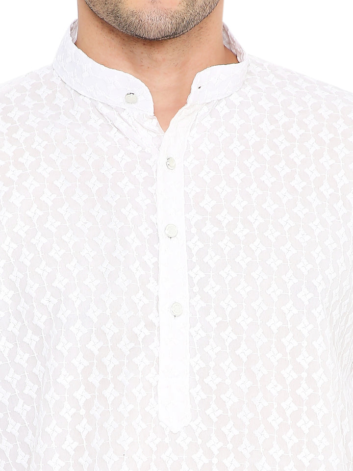 Close-up of White Sequin Kurta collar and button placket, highlighting intricate embroidery and fine georgette texture for festive elegance.