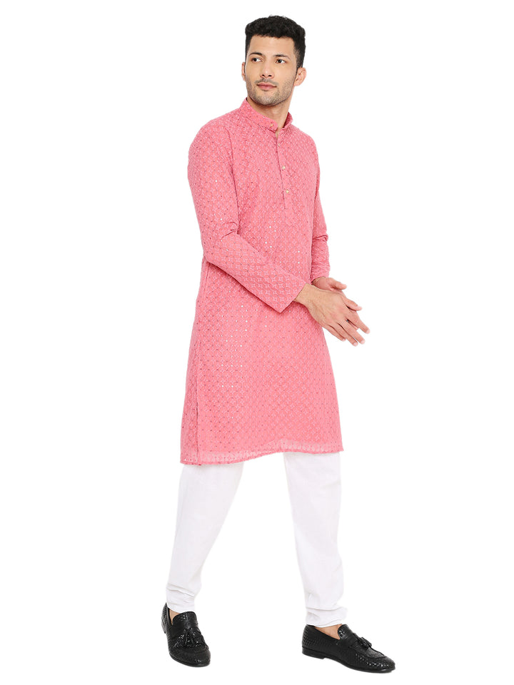 Men’s pink georgette kurta with sequin detailing and band collar, styled for festive and wedding wear in traditional fashion.
