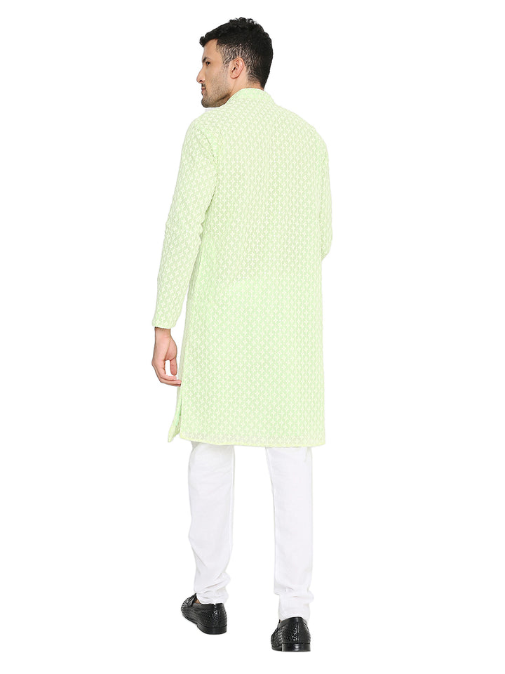 Back view of mint green georgette kurta featuring subtle sequin embroidery, showcasing lightweight fabric and traditional straight-cut design.