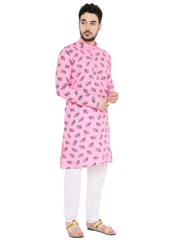 Side pose of pink Magic Cotton Kurta with Krishna Janmashtami prints, styled with white bottoms for ethnic festive gatherings.