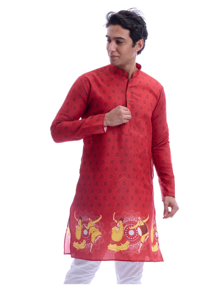 Side view of red Navratri kurta pyjama set with yellow dancing figures and mandala motifs, crafted in soft cotton for comfort.