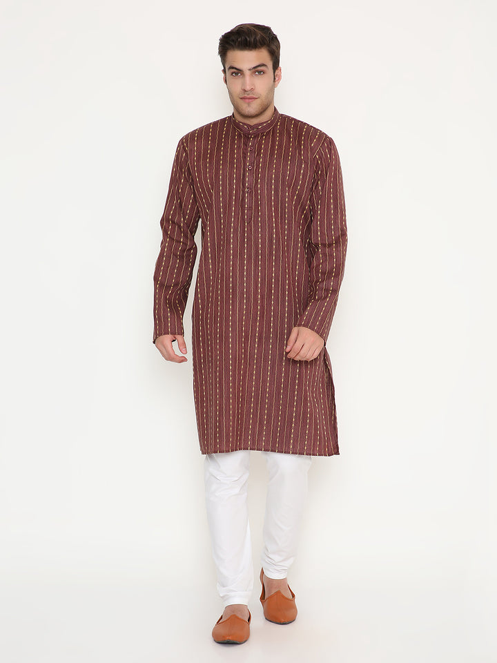 Full front view of maroon ethnic kurta set featuring regular fit and vertical ethnic patterns, paired with white bottoms for traditional occasions.