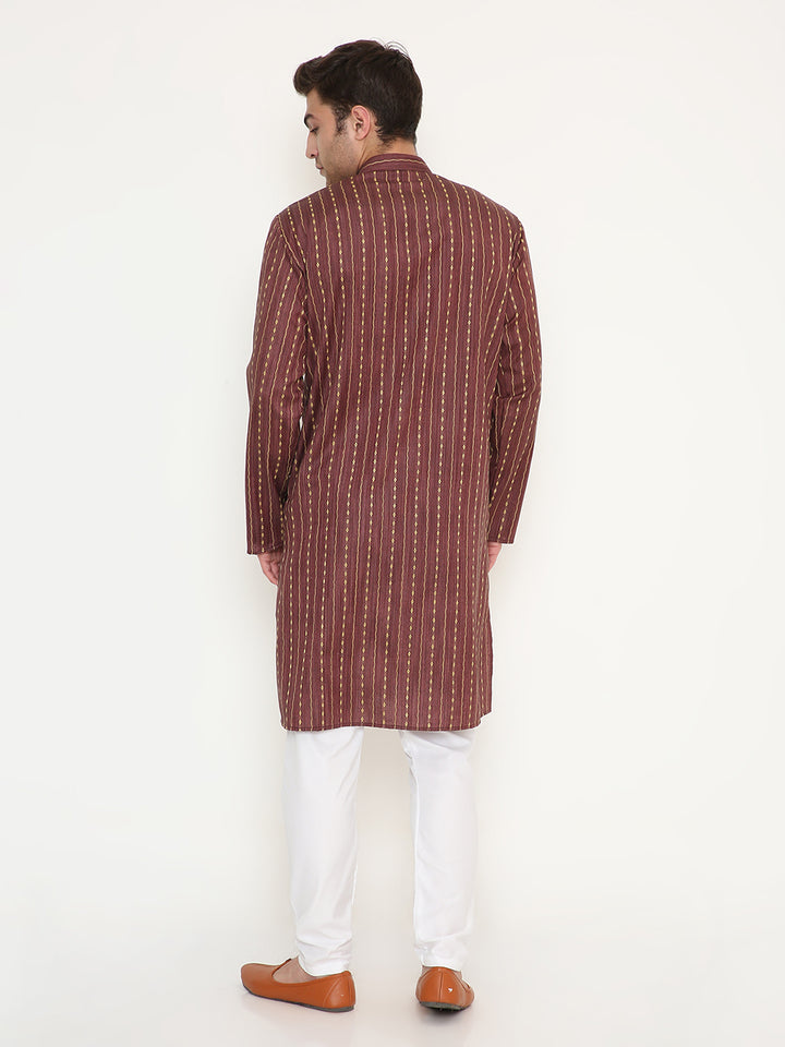 Back view of maroon ethnic kurta set in poly viscose fabric, showcasing straight hem and side slits for comfort and movement.