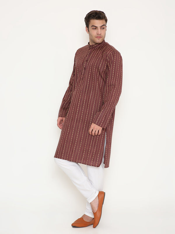 Maroon ethnic kurta set in poly viscose with golden vertical design, styled with white churidar and tan mojaris. Ideal for festive or casual wear.