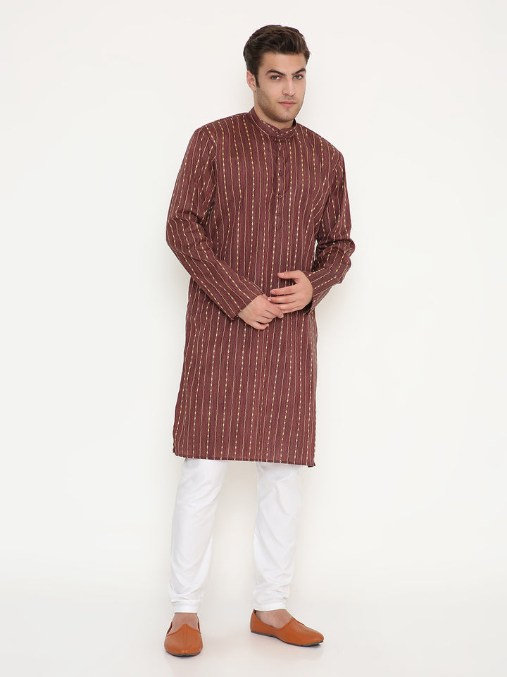 Front-facing maroon ethnic kurta set with mandarin collar and button placket, paired with white churidar for a complete traditional look.