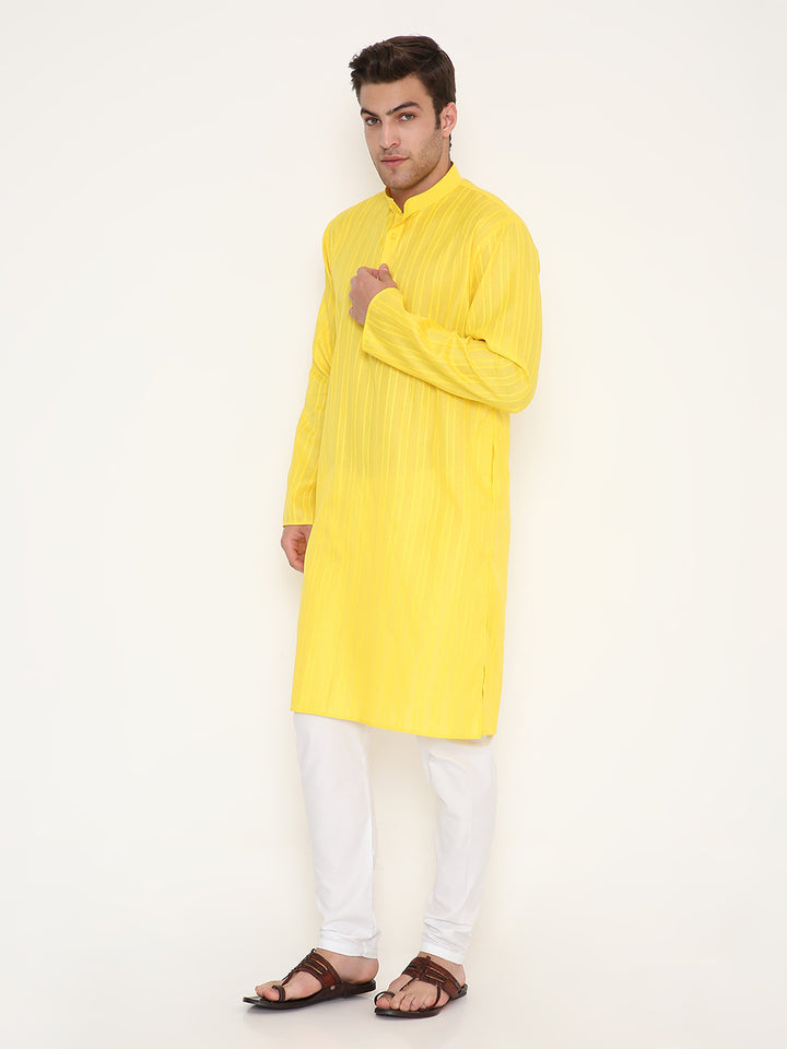 Stylish Yellow Kurta Poly Viscose with self design and button placket, paired with white bottoms. Perfect for ethnic celebrations and events.