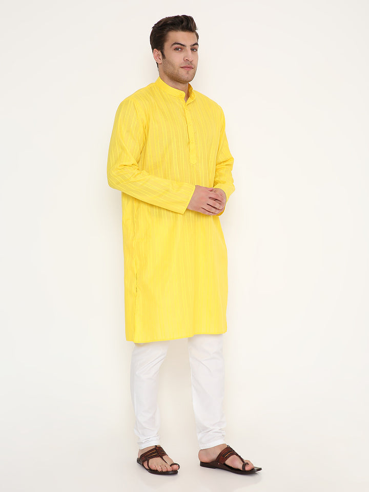Side view of Yellow Kurta Poly Viscose with self design, showcasing regular fit and mandarin collar. Ideal for festive and cultural wear.