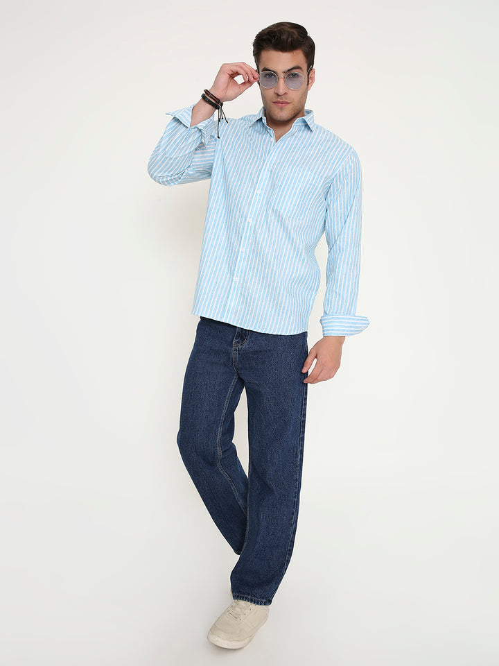 Full body view of Slim Fit Striped Shirt - Men's Sky Blue Wear paired with jeans, perfect for casual or semi-formal occasions.