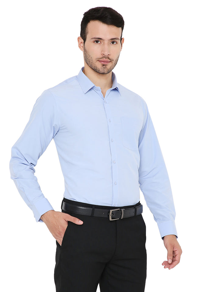 Model wearing Baby Blue Slim Fit Formal Shirt - Maharaja Collection with hand in pocket, showcasing modern fit and elegant design.