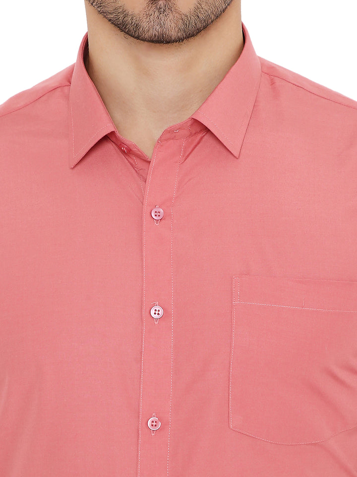 Close-up of collar and buttons on Pink Solid Slim Fit Shirt - Formal Wear, showing fine stitching and quality craftsmanship.