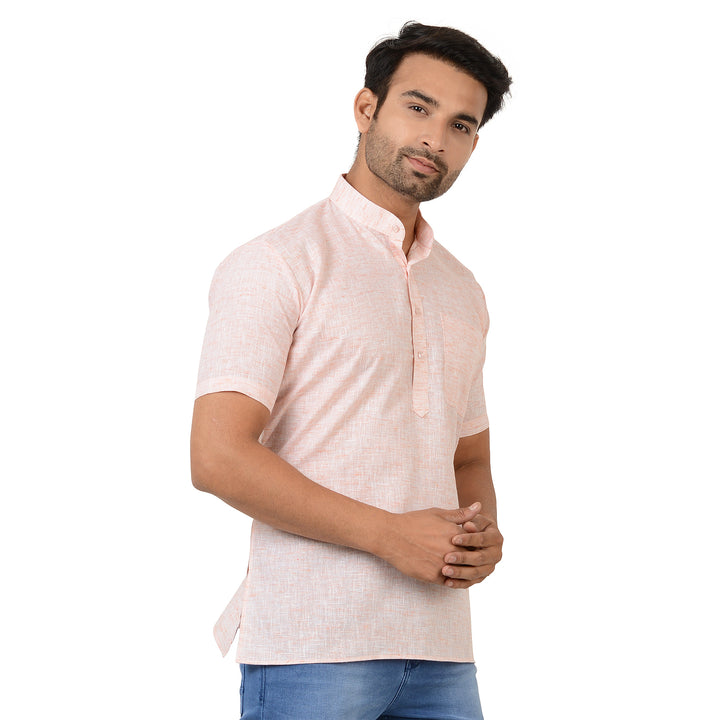 Versatile Orange Cotton Kurta with breathable fabric and side slits, designed for comfort and style in warm climates.