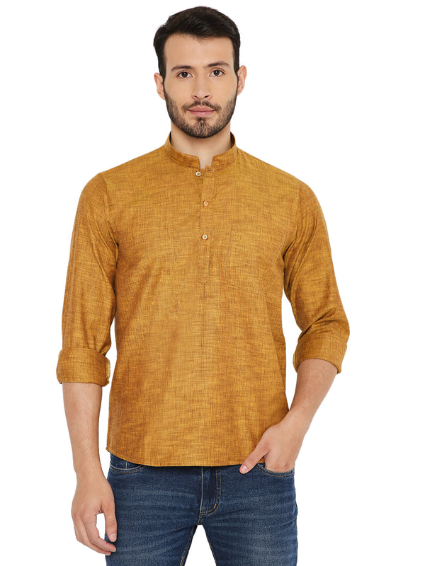 Yellow linen short kurta with mandarin collar and button placket, styled for summer comfort in Maharaja look.