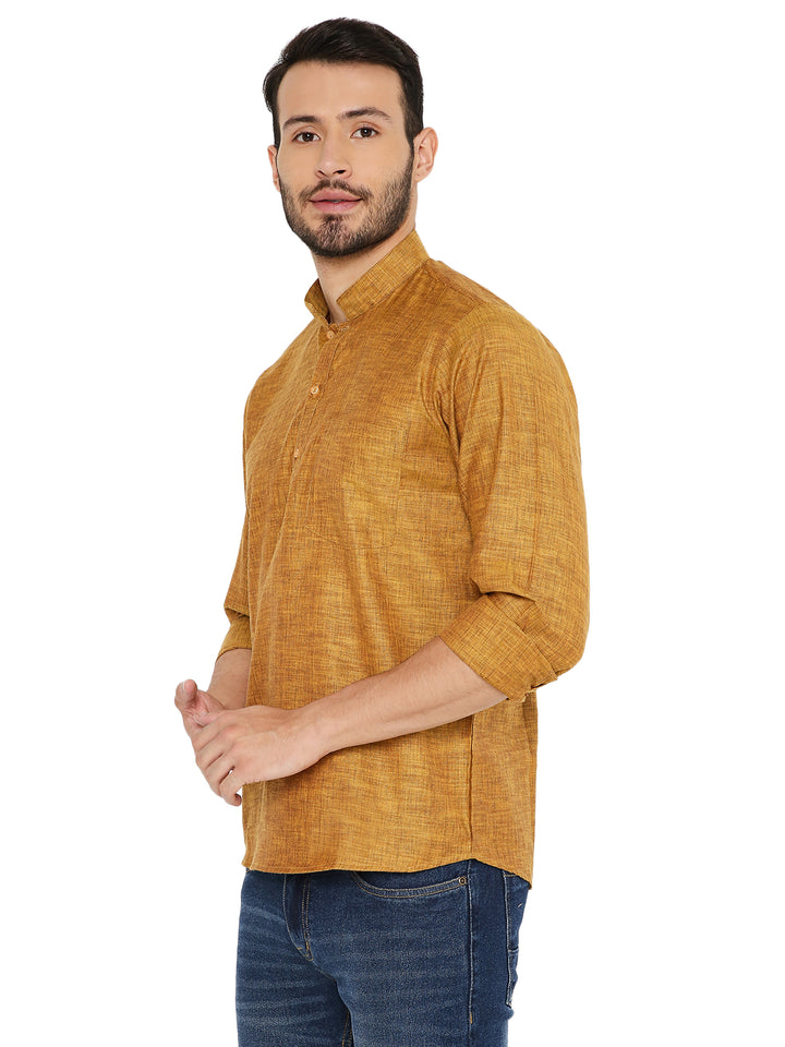Side view of yellow linen kurta showcasing breathable fabric and rolled-up sleeves, ideal for traditional summer wear.
