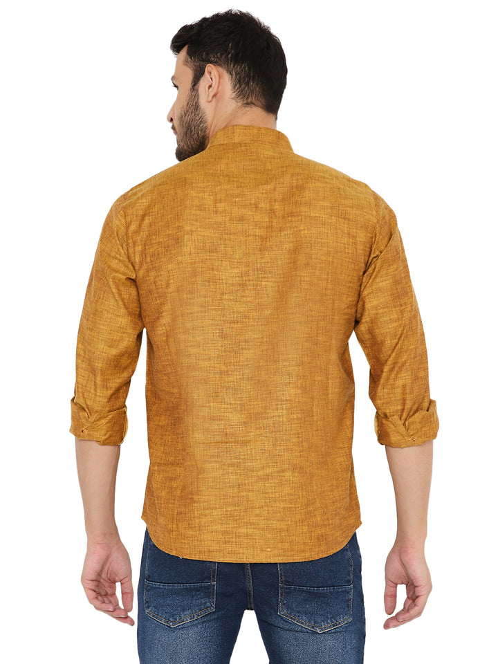 Back view of yellow linen short kurta highlighting its relaxed fit and lightweight fabric for warm weather.