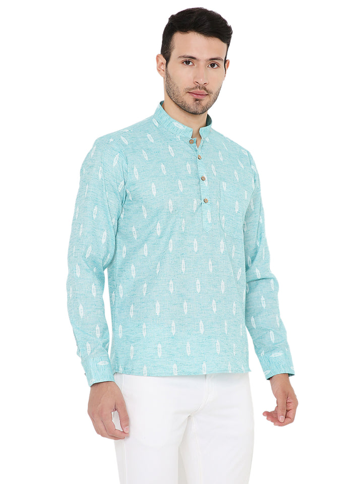 Front angled view of Blue Linen Kurta featuring white ikat prints and wooden buttons, ideal for casual ethnic summer looks.