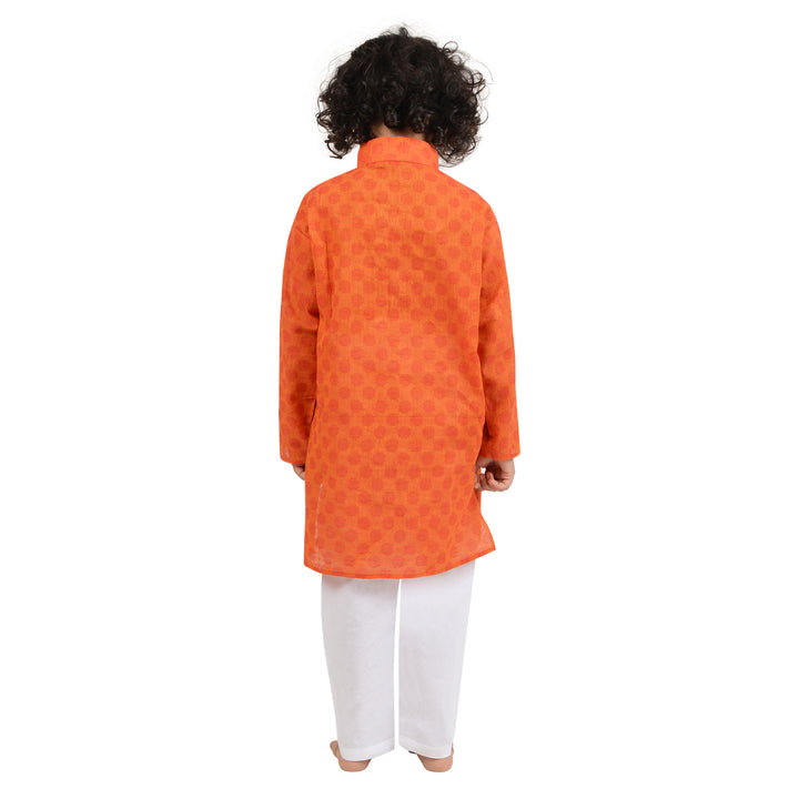 Back view of Maharaja Boys Kurta Pyjama Set in dark orange cotton fabric, highlighting the kurta's length and fit.