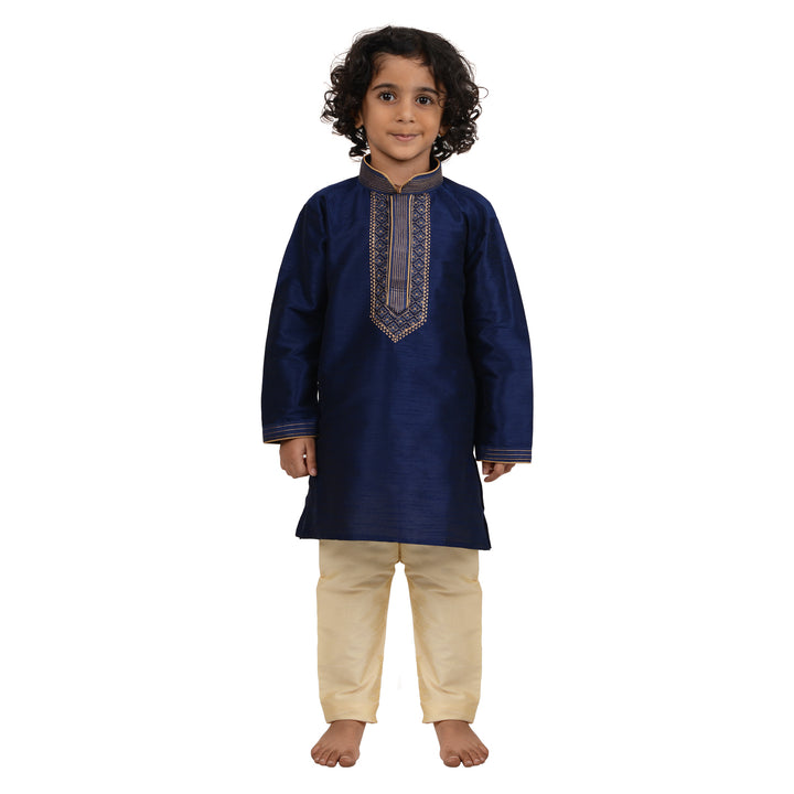 Art Silk Kurta Blue - Kids Gold Embroidered Set featuring a boy in a royal blue kurta with beige churidar, ideal for festive occasions.