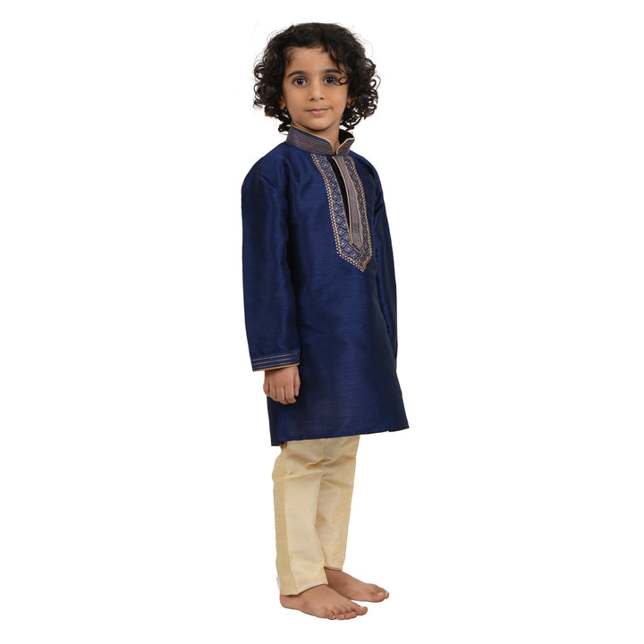 Art Silk Kurta Blue - Kids Gold Embroidered Set in a graceful pose, highlighting the intricate neckline embroidery and festive design.