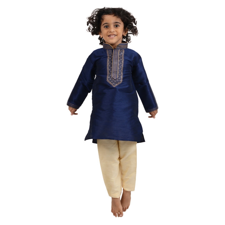 Playful moment in Art Silk Kurta Blue - Kids Gold Embroidered Set, combining comfort and festive elegance for boys' traditional wear.