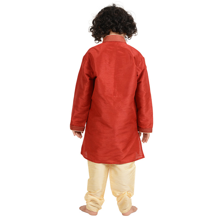 Back view of Kids Gold Kurta Set showing plain red art silk kurta and cream churidar, designed for comfort and elegance in festive wear.