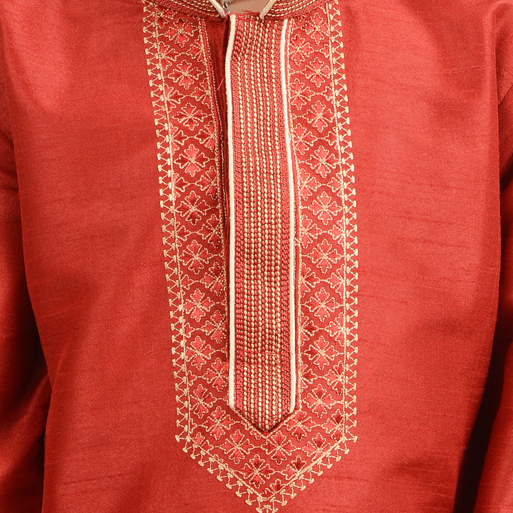 Close-up of gold embroidery on red art silk kurta from Kids Gold Kurta Set, highlighting intricate traditional design for boys' ethnic wear.