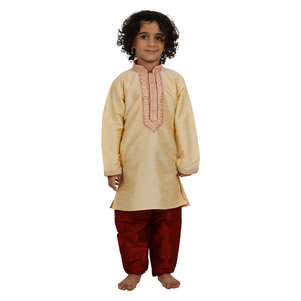 Art Silk Kurta - Kids Gold Kurta Set with red embroidery, featuring a long-sleeve gold kurta and red churidar pants for boys.