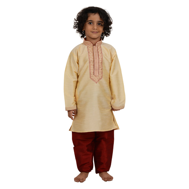 Art Silk Kurta - Kids Gold Kurta Set with red embroidery, featuring a long-sleeve gold kurta and red churidar pants for boys.