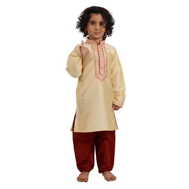 Boy giving thumbs up in Art Silk Kurta - Kids Gold Kurta Set, perfect for festive celebrations and cultural events.