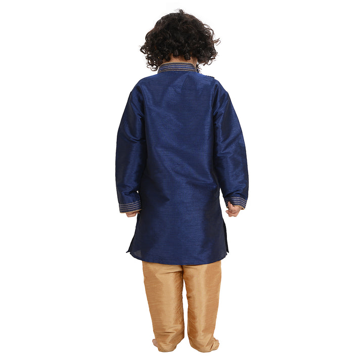 Back view of Blue Kids Kurta Set - Art Silk Side Button reveals the smooth finish and comfortable fit of the boys' traditional outfit.
