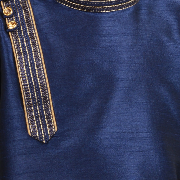 Close-up of Blue Kids Kurta Set - Art Silk Side Button showing intricate gold stitching and button detailing on the neckline.